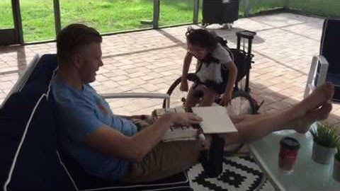 Dad talking to Angela using PODD