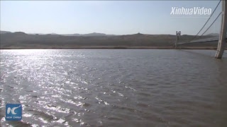 Exploring China's first 3D glass bridge over Yellow River