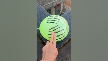 Experiment: Will a water balloon explode if it rolls down a tall building? 💥🎈 #balloon