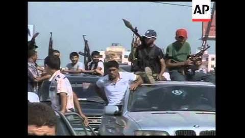 Lebanon - Gunmen take to the streets following killing of security chief / Angry protest after car b