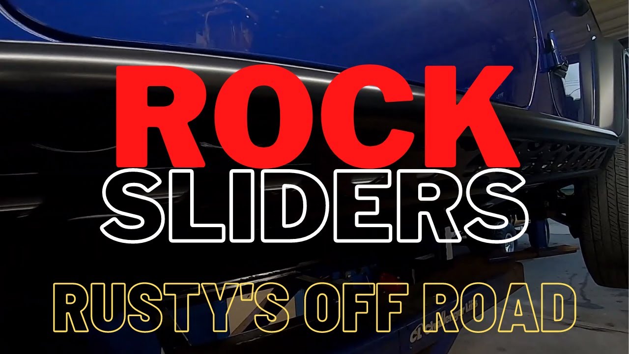 Bolting in a set of Rusty's Off Road Rock Sliders onto the JL Wrangler ...