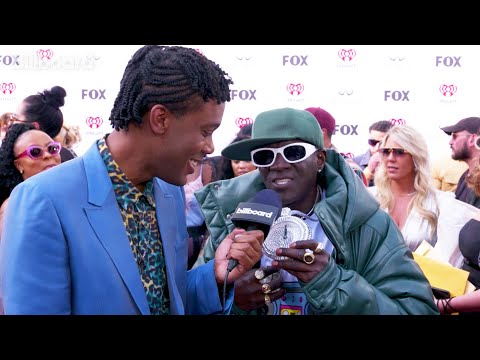 Flavor Flav Reveals He's A Fan of Taylor Swift | iHeart Radio Music Awards 2023