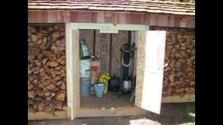 This holds up to 2 cords of firewood and a small storage shed in between. There are two rows of wood on each side. I used 