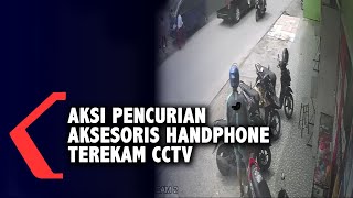 AKSI PENCURIAN AKSESORIS HANDPHONE TEREKAM CCTV