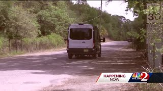 Marion County officials investigating after 1 dead, 1 injured found laying on side of road