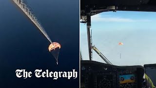 video: Watch: Helicopter catches reusable rocket 6,500ft above the sea