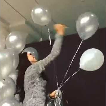 Beautiful Girl Stabbing Balloons After the Event