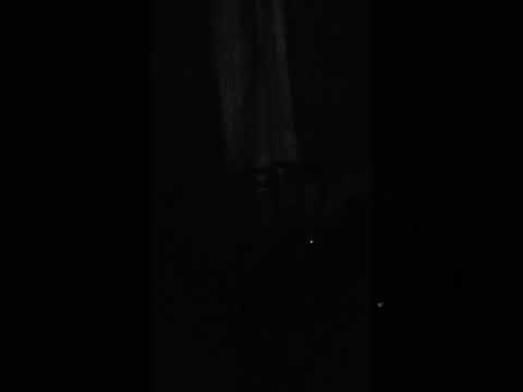 Shadow figure on curtain