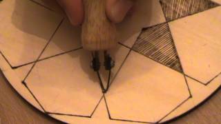 Pyrography project of an Islamic pattern http://www.smilingwood.com This video shows how use Pyrography or wood burning art to draw an islamic pattern on wood