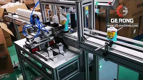 Oval bottle switch type robot hand feeding positioning labeling machine