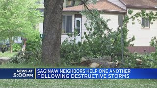 Saginaw neighbors come together to help one another with storm damage
