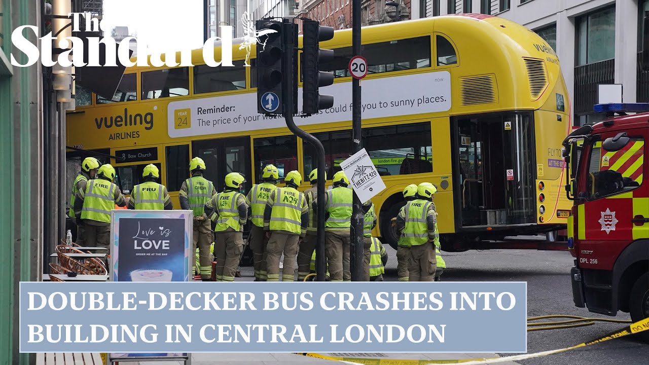 Double-decker bus crashes into building in central London