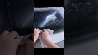 Black and white spray-painted starry sky artwork