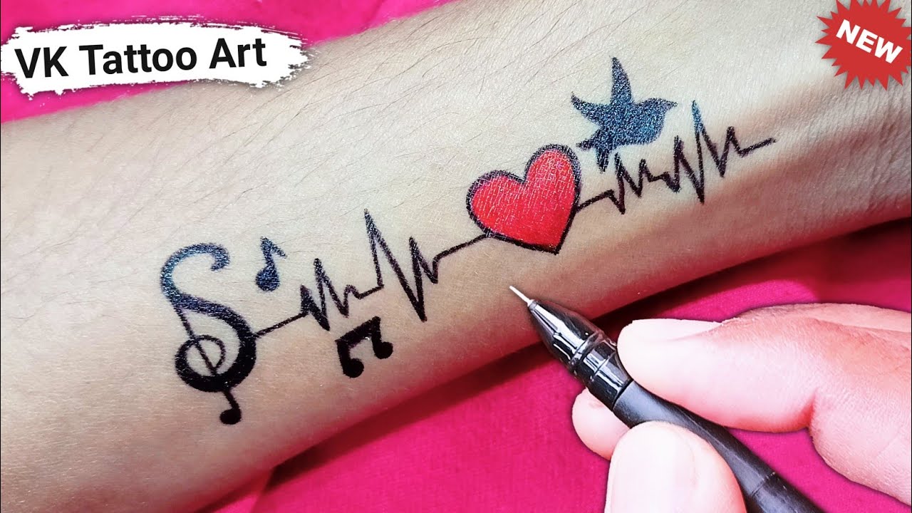 Amazing S letter tattoo with simple heart on hand | S name tattoo ...