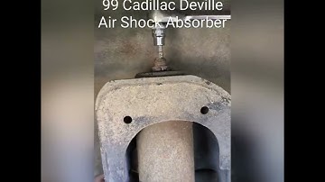 How to change a 99 Cadillac DeVille air shock absorber