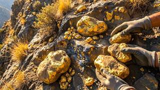 At mountain mineral-rich cliffside where exposed gold nuggets at mountain