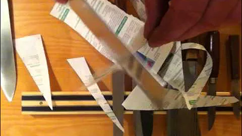 Some of my knives cutting phone book paper