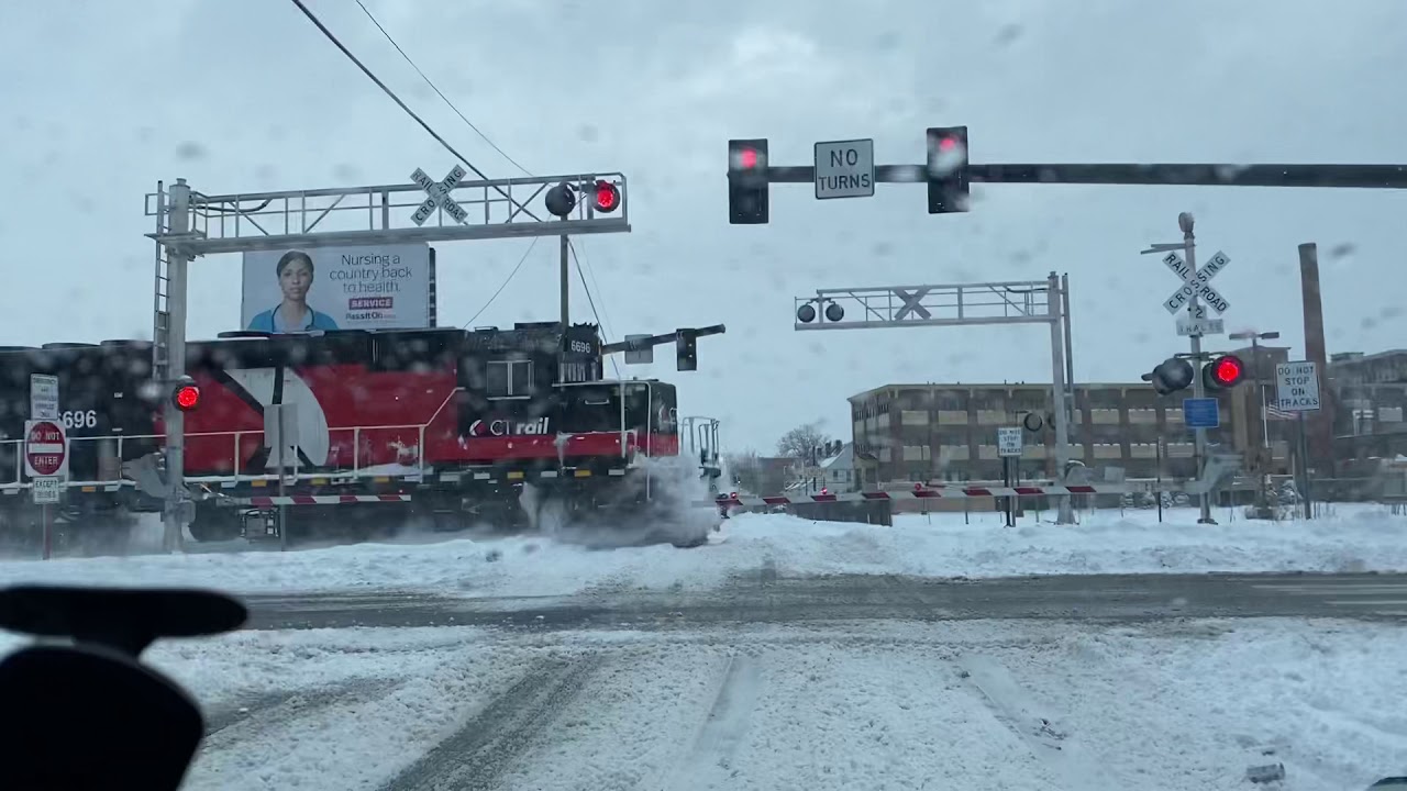 CT Rail -commuter train in snow with loud horn!-Hartford line by Hamilton st crossing