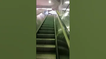 UP THE ESCALATORS AT ACADIE METRO STATION IN MONTREAL 