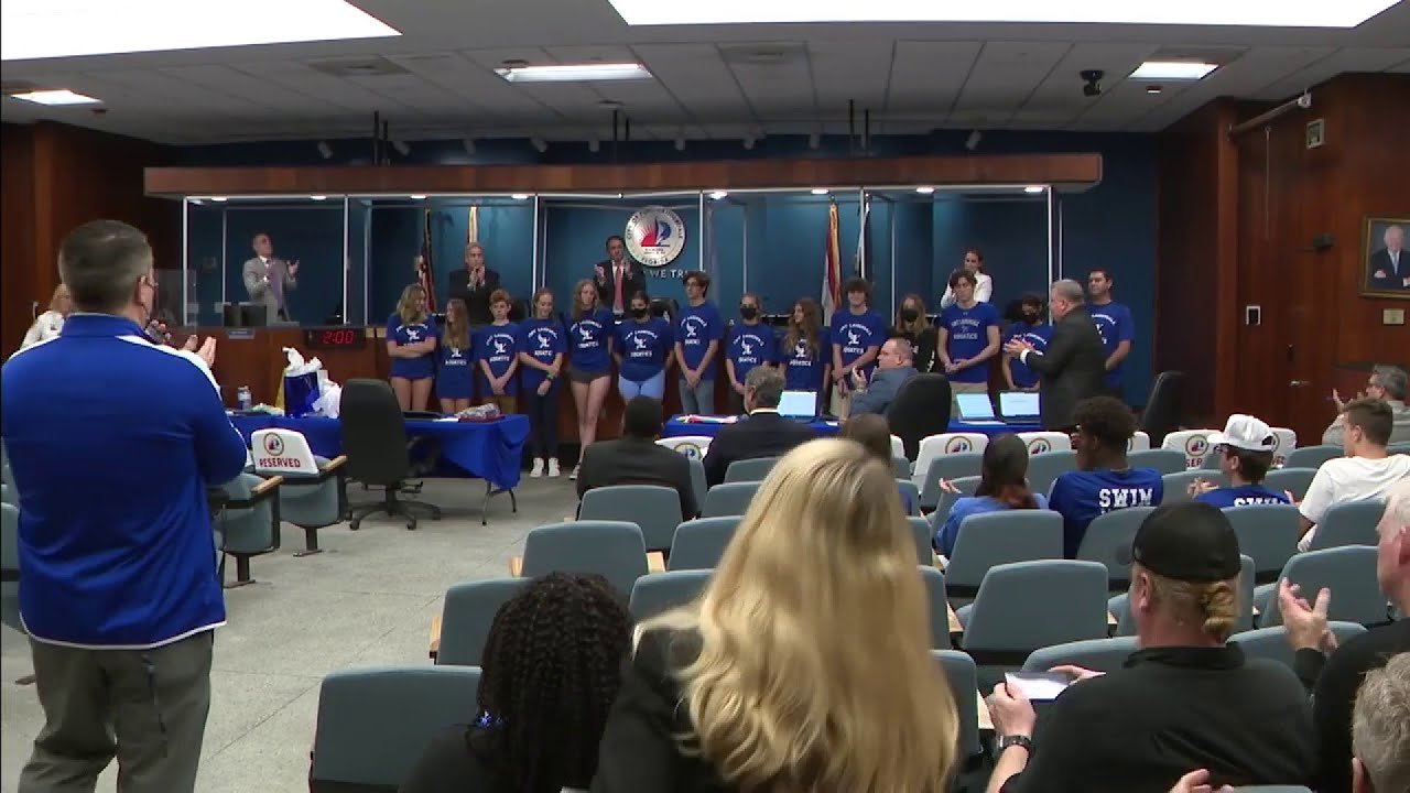 High school swim team honored for saving teammate's life