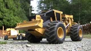 Loading the Tigercat on to the lowbed