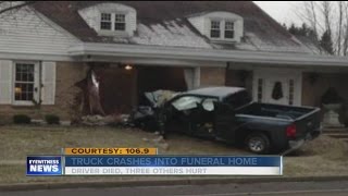 Man dead after crashing truck into funeral home