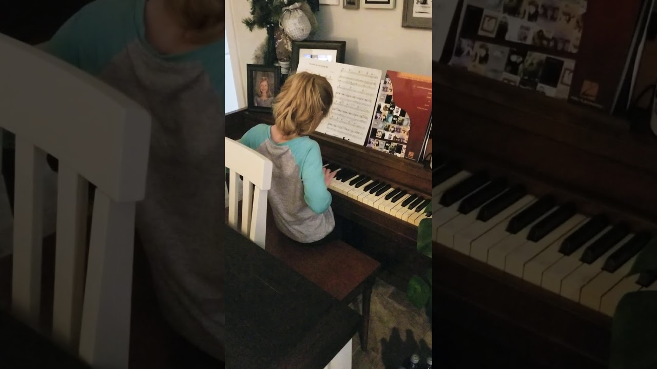 Lily on the piano YouTube