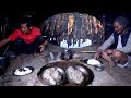 Jk is cooking buff dry mean  rice in their buffalo shed  himalayan nepal 