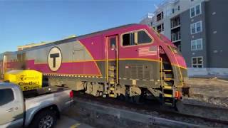 Foxboro MBTA Commuter Rail crosses Walpole Station.