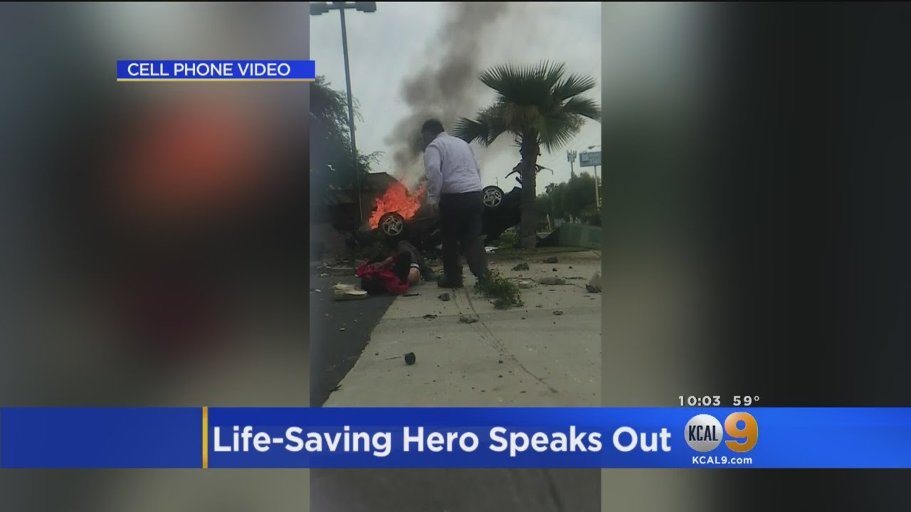 Caught On Tape Good Samaritan Pulls Man Out Of Burning, Overturned Car