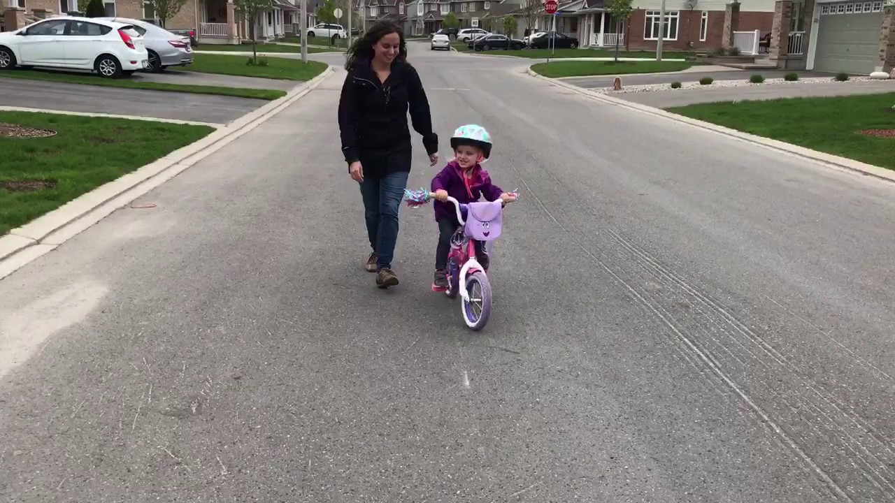 Riding her bike without training wheels! YouTube