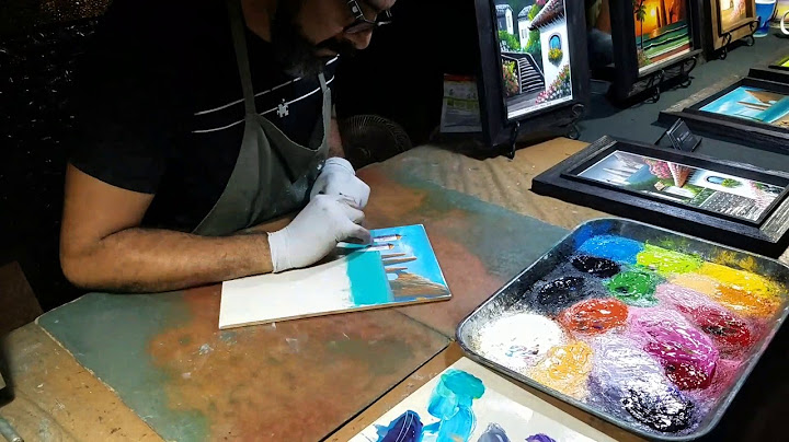 Amazing Cabo street artist painting on tile with his fingers timelapse