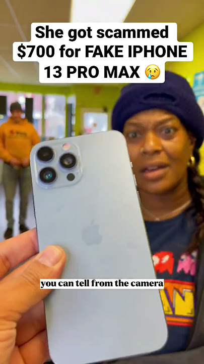 SHE GOT SCAMMED $700 FOR A FAKE IPHONE 😢 #shorts #fake #iphone14promax #apple #iphone #ios