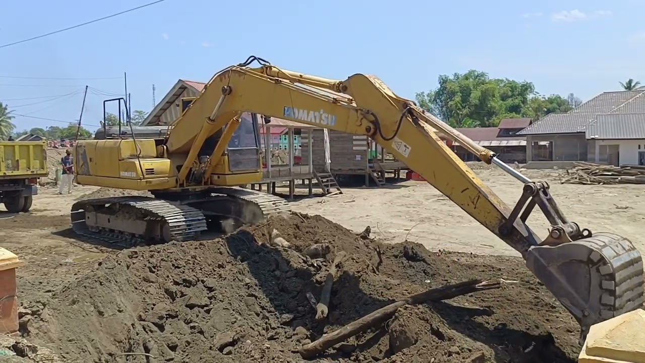 a Komatsu excavator heavy equipment is carrying out new infrastructure construction