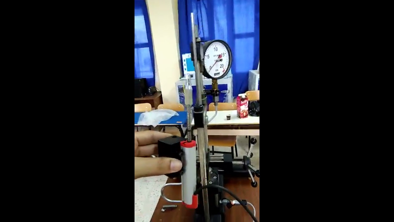 تجربة الشد البسيط بجهازالتجارب الشامل حصة اعمال مؤطرة