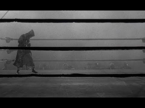 The opening image of Raging Bull shows an unnamed fighter shadowboxing on the left hand side of the screen. The learn the movie follows the rise and fall of professional boxer Jake LaMotta  and the trials and tribulations of his life.