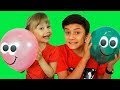 Alena and Pasha plays with balloons in school