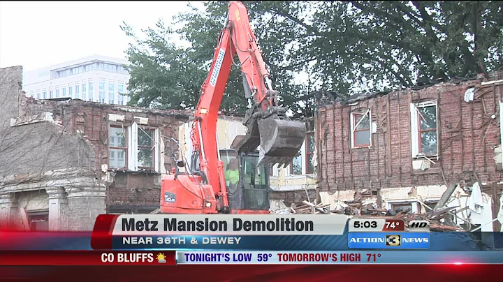 Crews tear down Metz Mansion damaged by fire