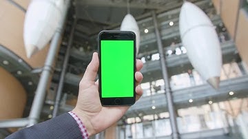 Hand Holding Phone With Green Screen Stock Video