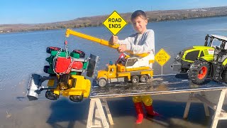 Darius and Francesca learn Road Signs for kids and save Tractors from the mud