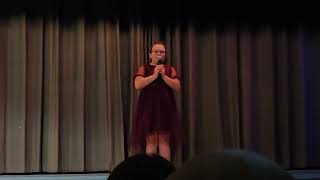 my daughter being amazing on stage singing "cups"