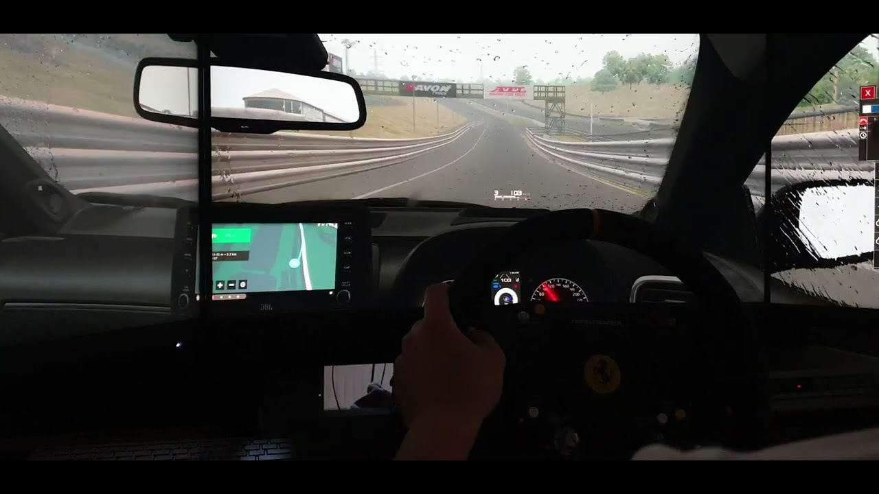 A working rearview camera and interactive car radio in Assetto Corsa