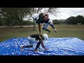 PLAYING TACKLE FOOTBALL ON A SLIP AND SLIDE PT. 2