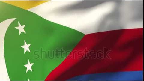 Comoros flag waving in the wind. Looping sun rises style. Animation loop Stock video by