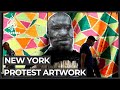 Nyc artists display blm street art on boardedup storefronts