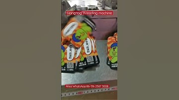 Full automatic hang tag threading machine