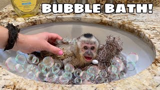 GIVING MY BABY MONKEY HIS FIRST BUBBLE BATH! WILL HE LIKE IT?!