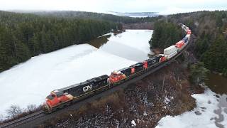 Awesome Aerial View! Very Long Stack Train CN 120 w/DPU passing Palmers Pond near Dorchester, NB
