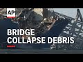 Coast Guard speaks on latest effort to clear bridge collapse debris