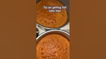 How to get flat cake tops. #bakingtips #youtubeshorts #shortsfeed #cake #cakedecorating